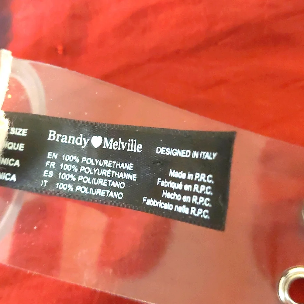 Set Of Two Clear and White Belts One With Tag Brandy Melville 36